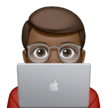 Person peeking from behind laptop